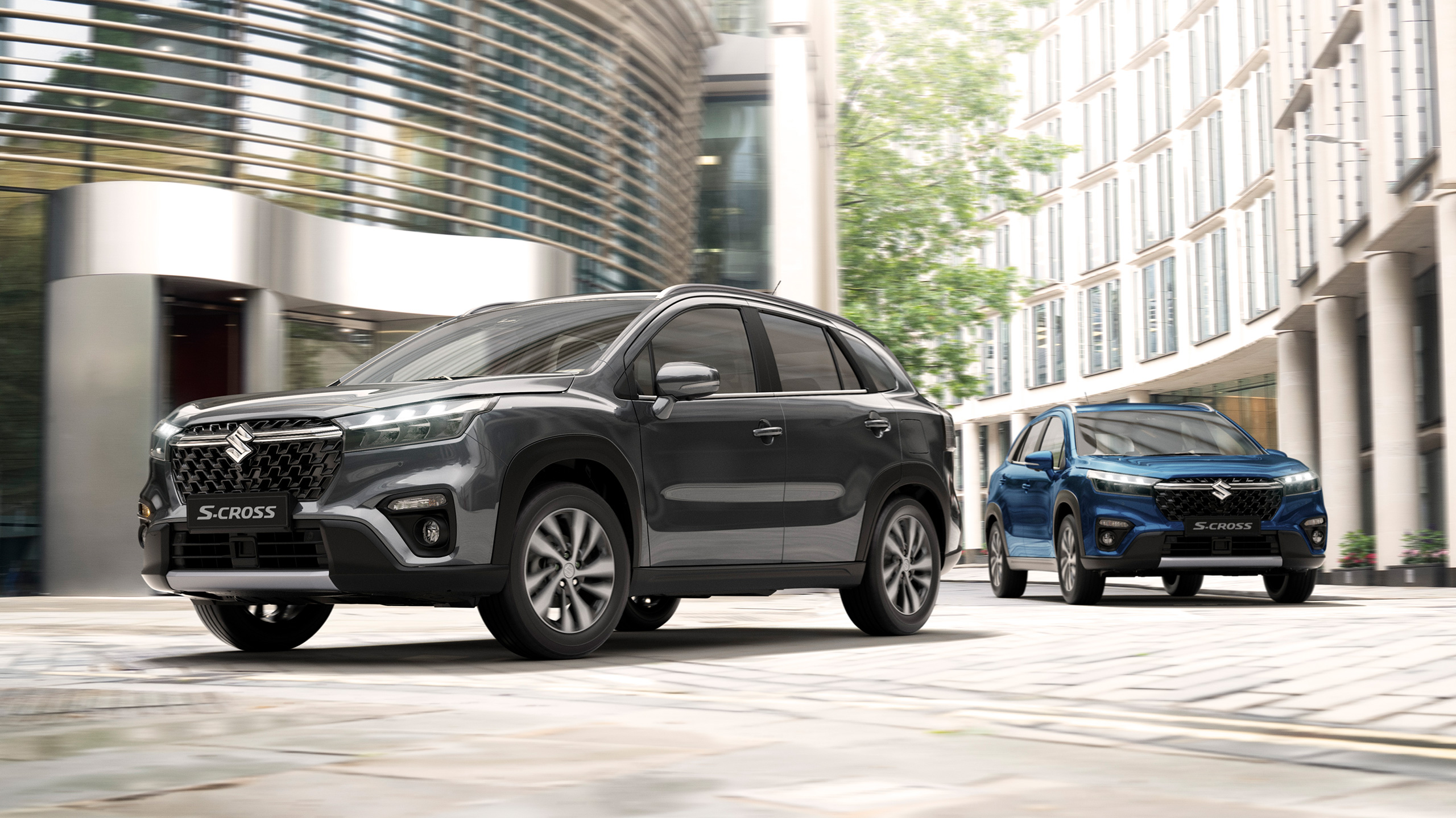 Suzuki S Cross silver and blue driving in city